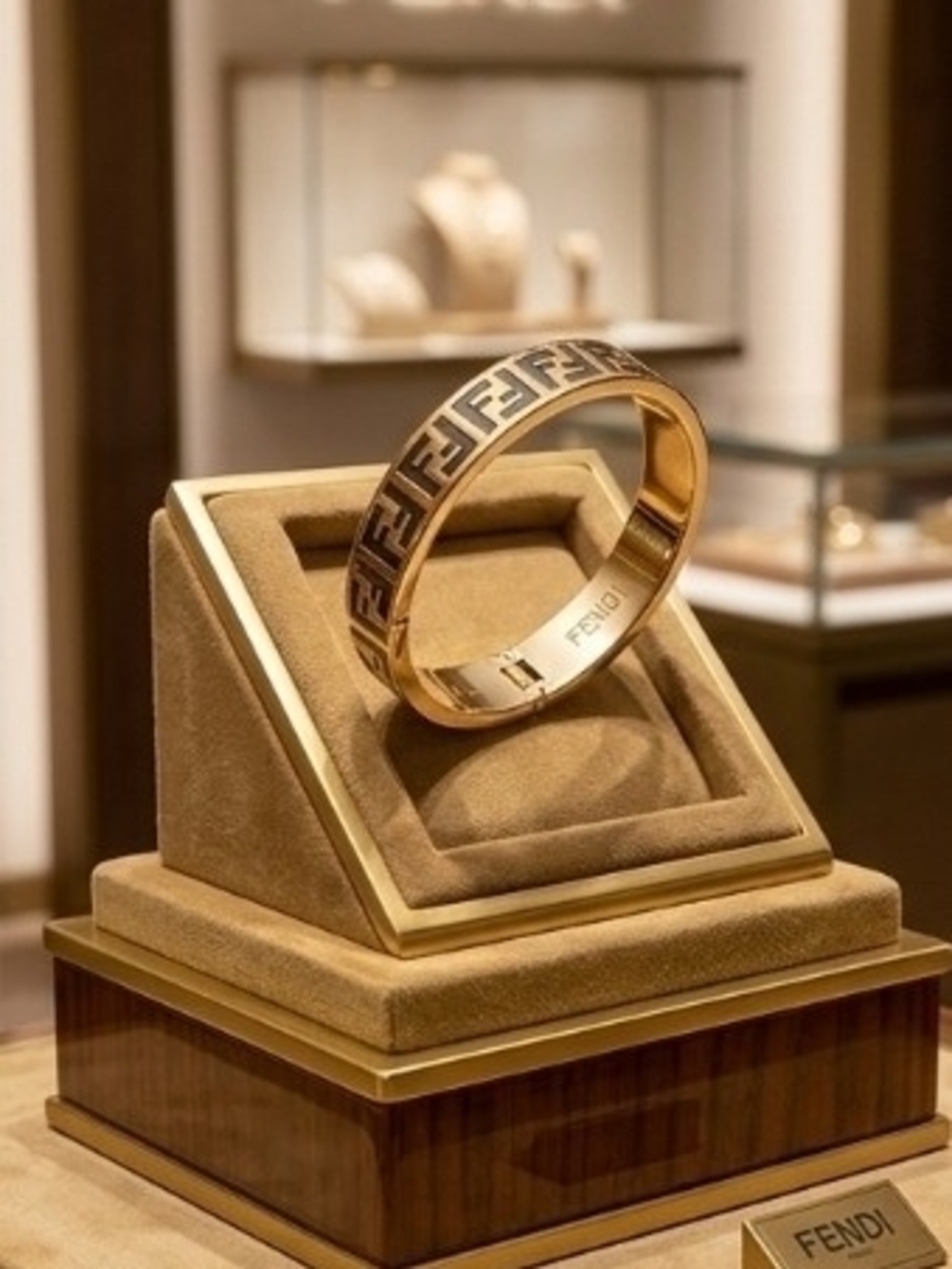 Gold Tone and Black Bangle
